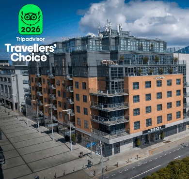 Modern hotel exterior with rooftop terrace, located in city centre, showcasing award win, ideal for urban explorers.